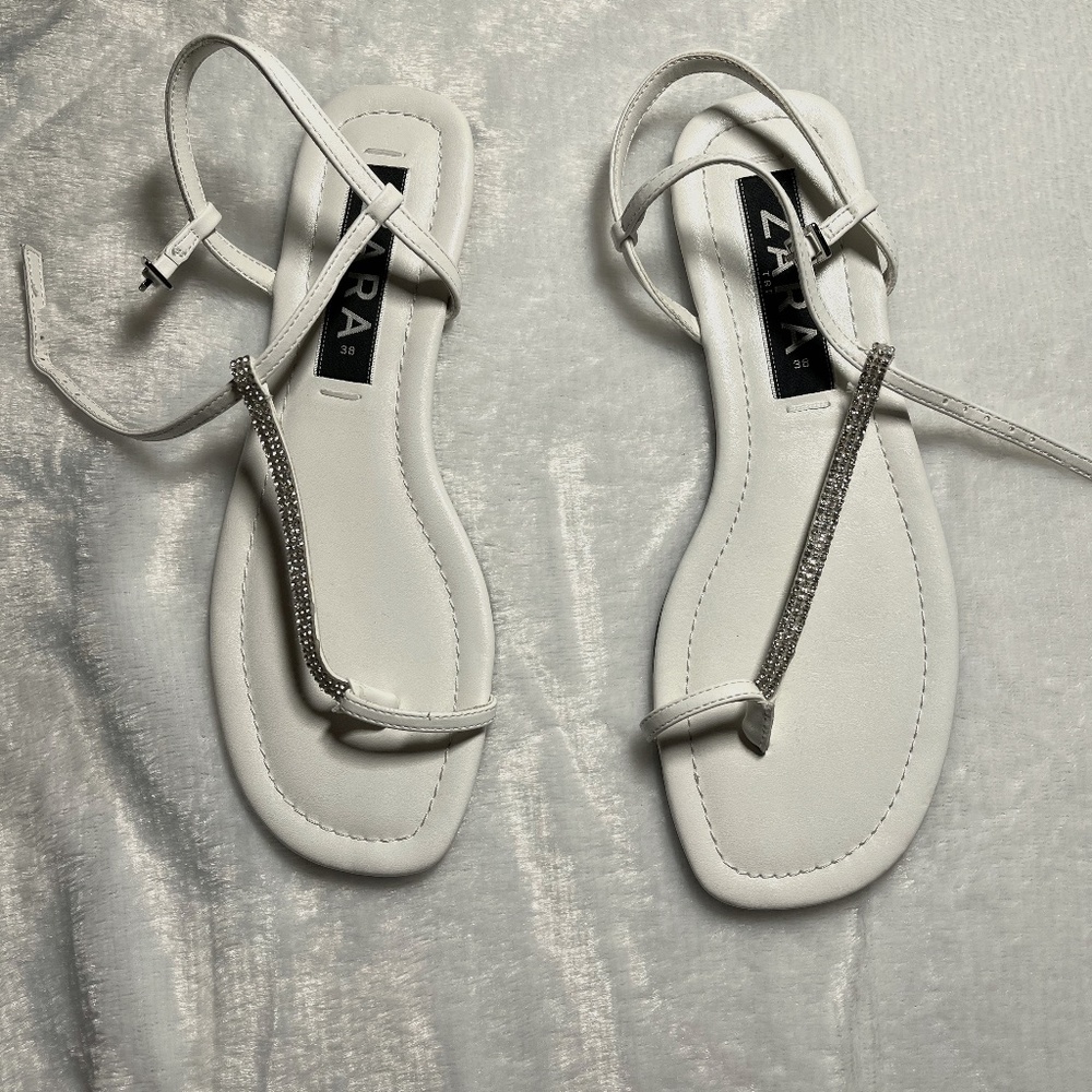 Zara, 8, White with a little glitter!